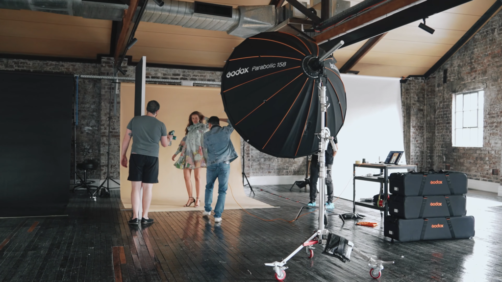 Studio fashion photo shoot with Godox parabolic reflector light focusing system P158 Kit
