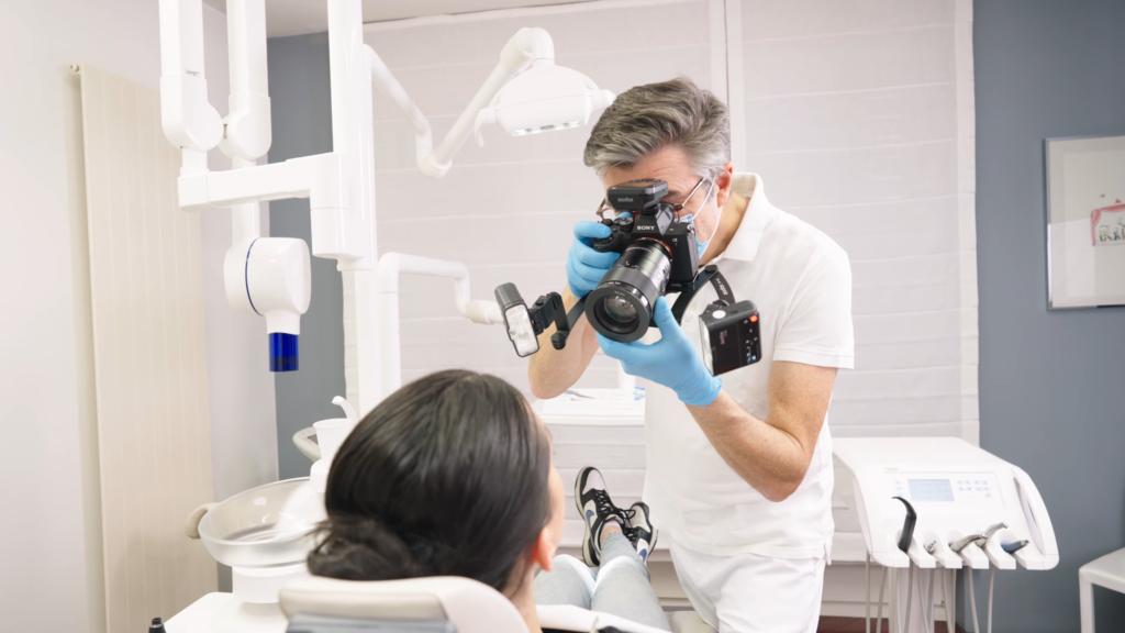 Godox MF12-DK1 twin flash kit used by a dentist during an appointment