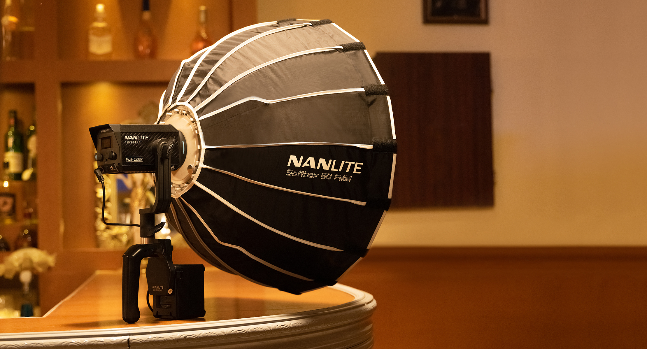 Nanlite Forza 60CR RGBLAC full color COB LED light with NP-F battery grip and softbox