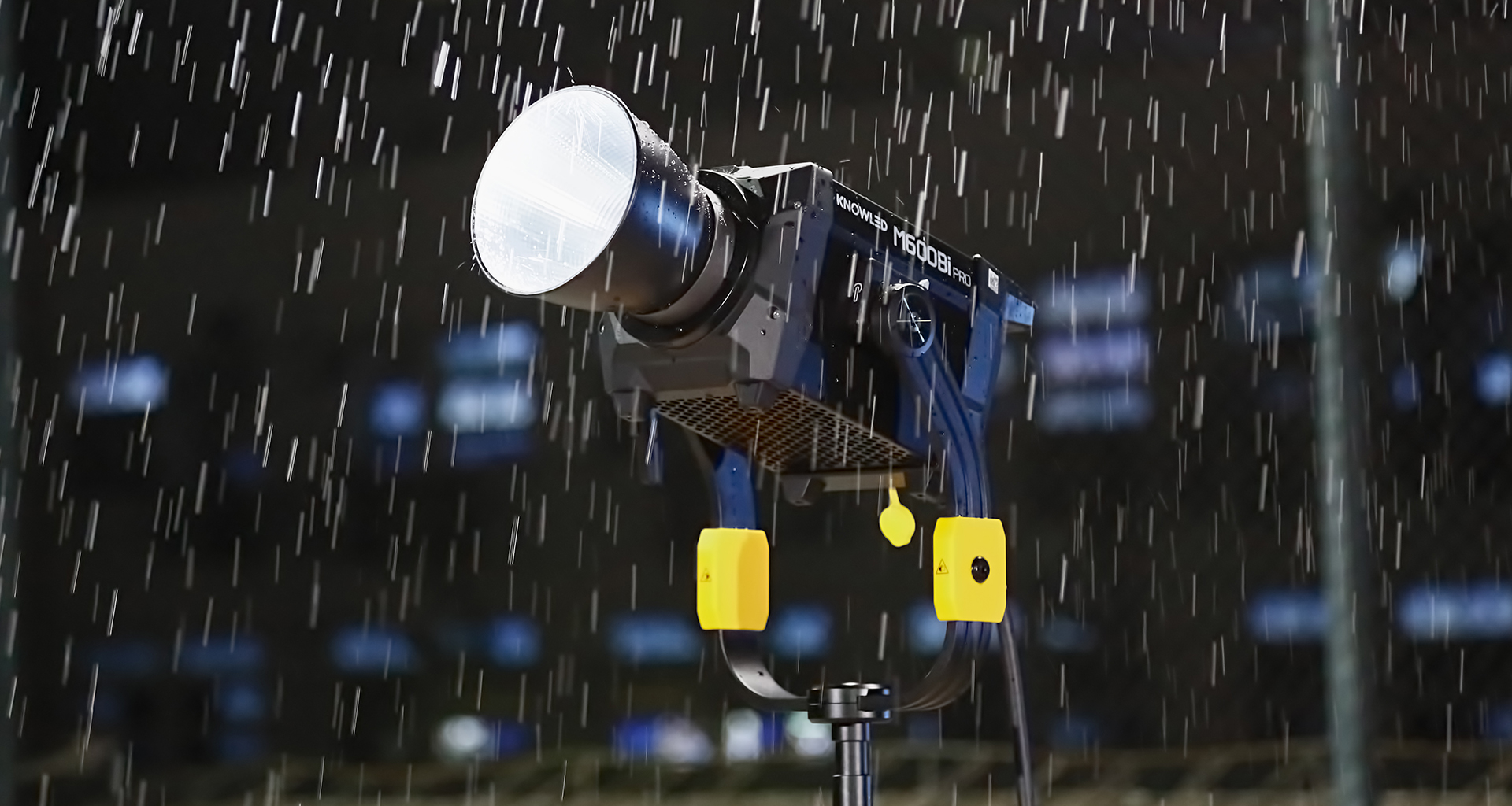 Godox KNOWLED M600Bi PRO Bi-Color weatherproof IP54 COB LED light for professional movie film production standing in rain