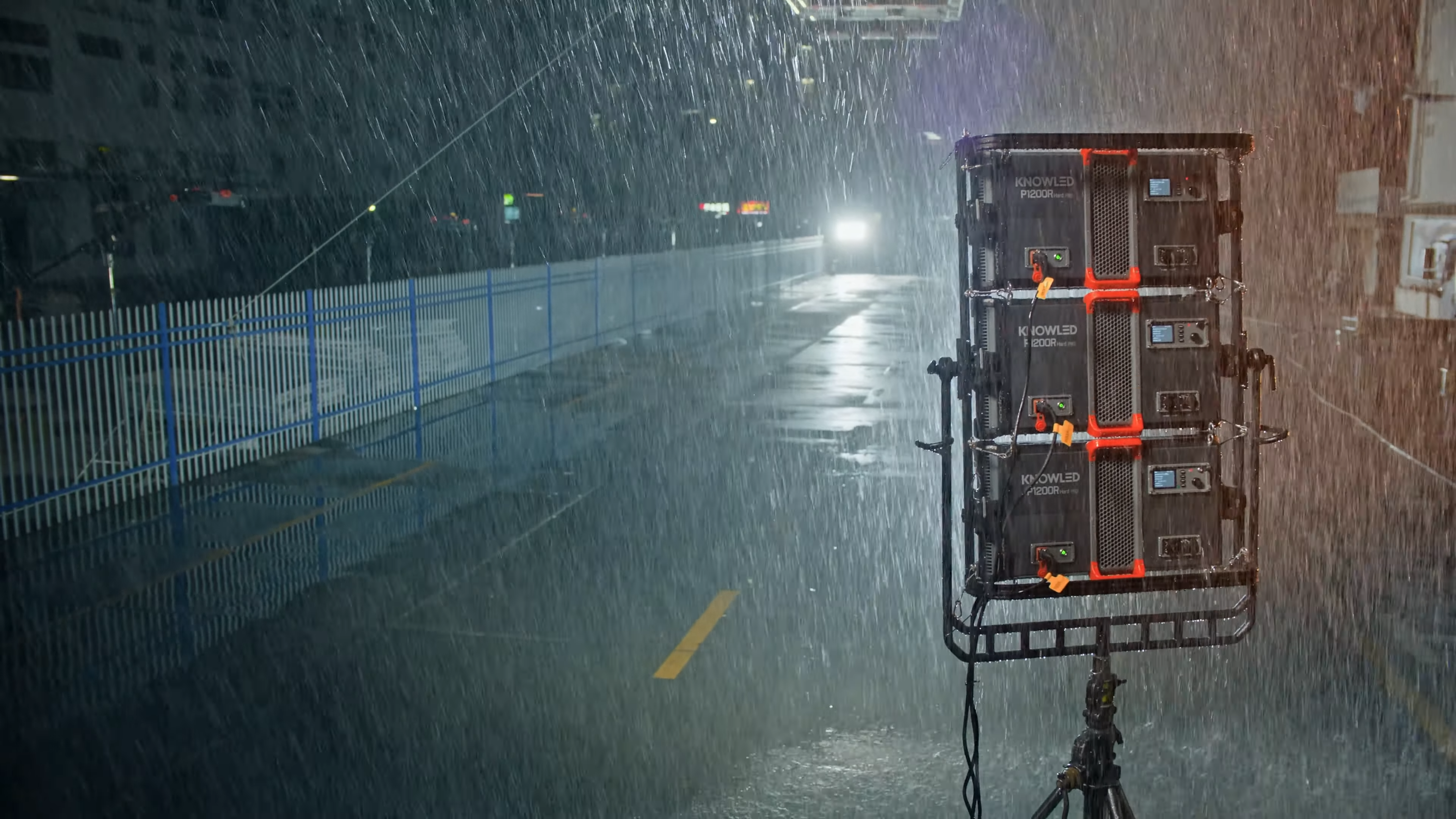 Godox KNOWLED P1200R Hard PRO professional full color LED panel light for video movie film production in triple bracket in rain on set